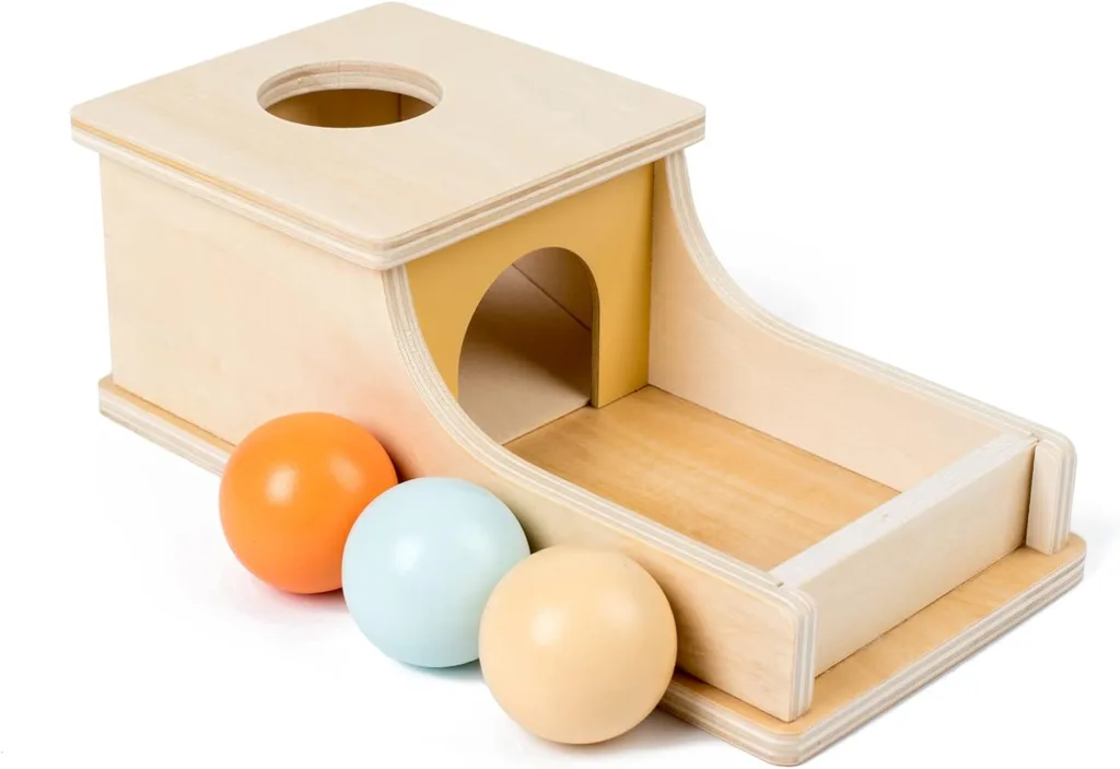 Enhance Your Baby’s Development with the Busy Box Wooden Ball Drop Toy